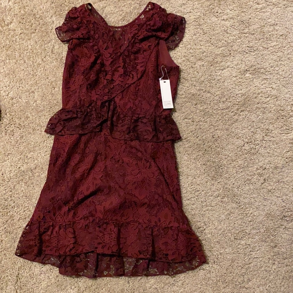 Maroon dress with lace and ruffle detail